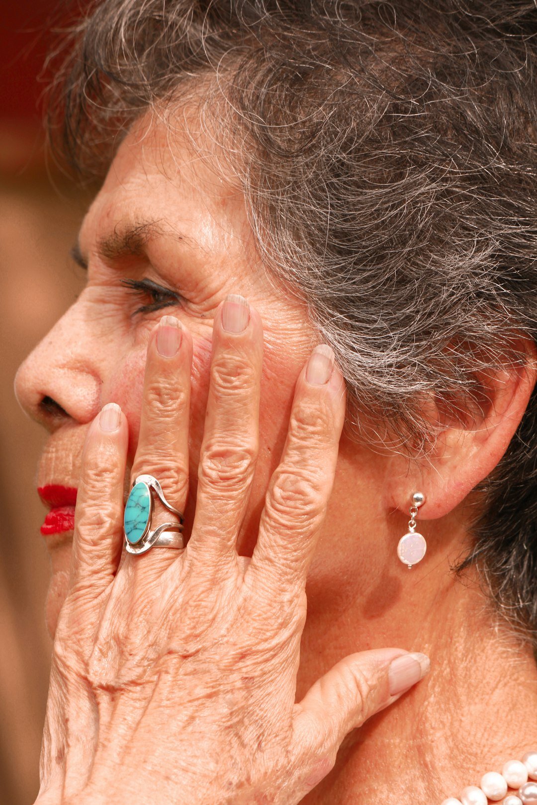 Portrait of an elderly Danish woman knitting